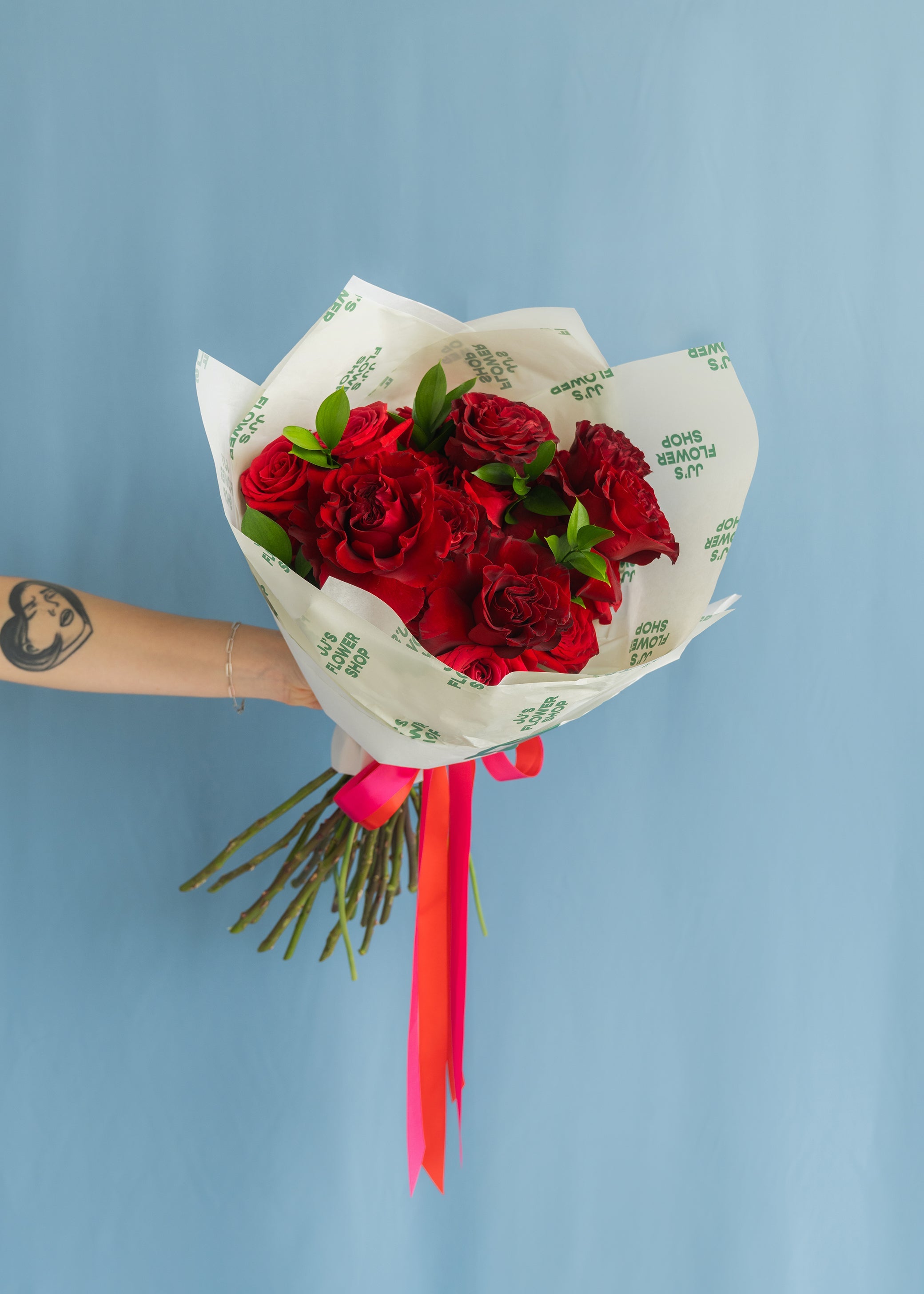 A hand-wrapped rose bouquet from JJ's Flower Shop in Atlanta