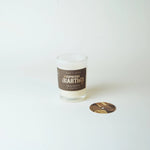 Candle with a label on a white background